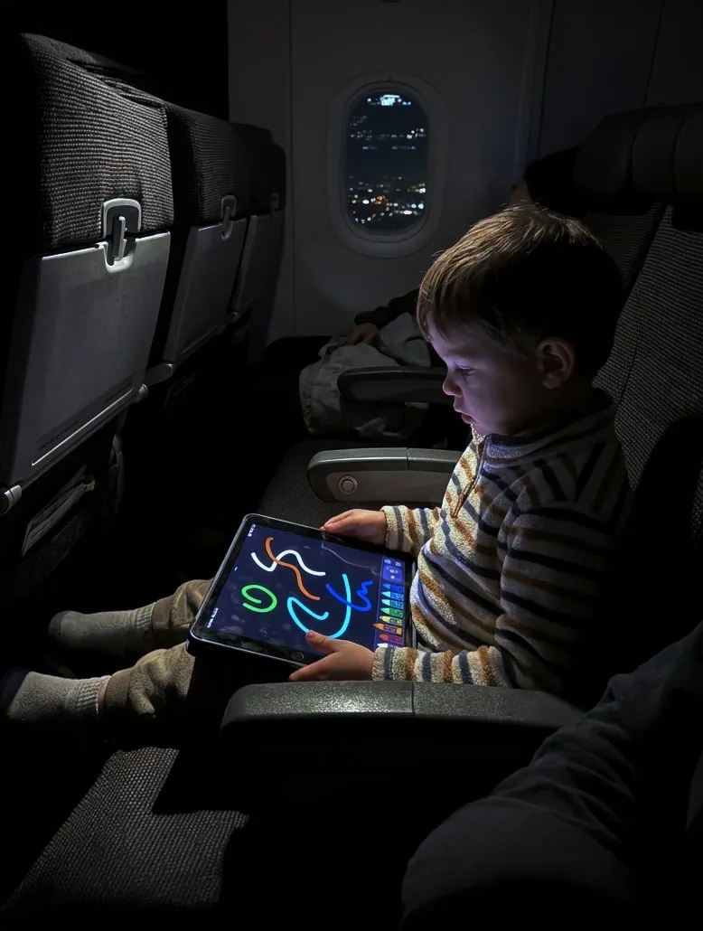 Child drawing on a tablet